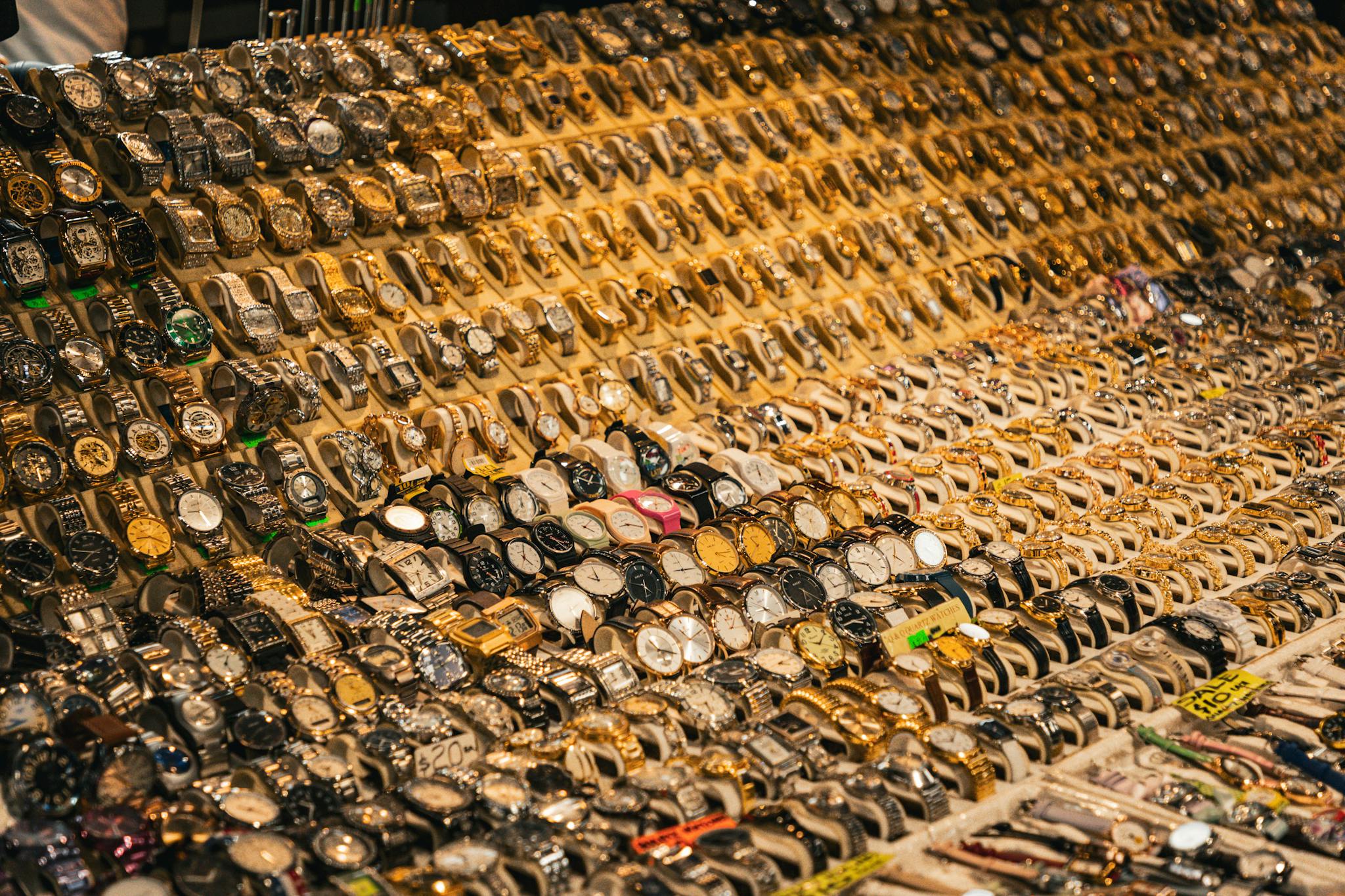 An extensive array of watches displayed at a Melbourne market, showcasing variety and style.